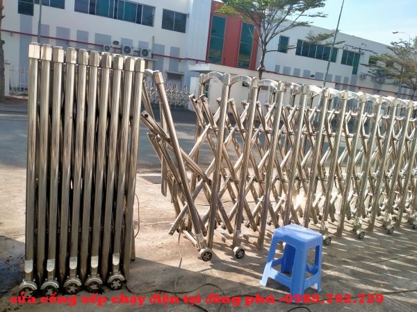 sửa cổng xếp chạy điện tại đồng phú