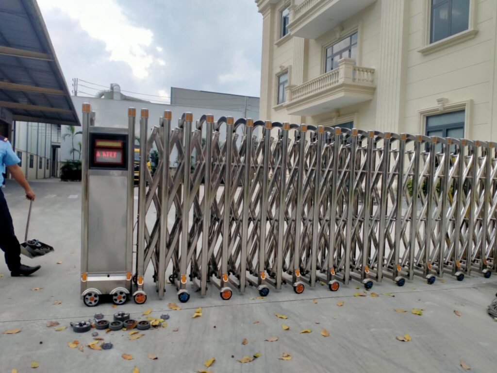 sửa cổng xếp chạy điện tại đồng xoài