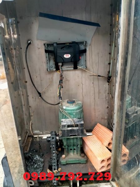 motor cổng xếp chạy điện tại hải phòng