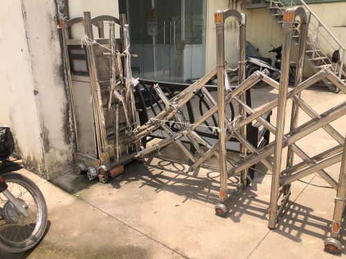 sửa cửa cổng xếp inox tại bến cát