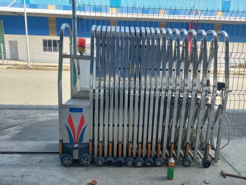 sửa cửa cổng xếp tại bến cát